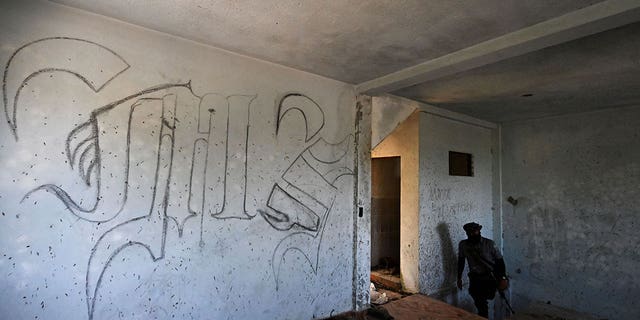 A graffiti linked to the Mara Salvatrucha gang is seen on an interior wall in San Martin, El Salvador, on March 22, 2023. Alleged senior MS-13 gang leader José Wilfredo Ayala-Alcántara was arrested in Mexico City on Tuesday.