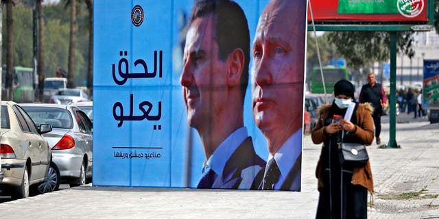 Assad and Putin billboard