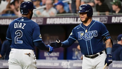 Yandy Diaz and Harold Ramírez celebrate in the third inning against the Houston Astros.