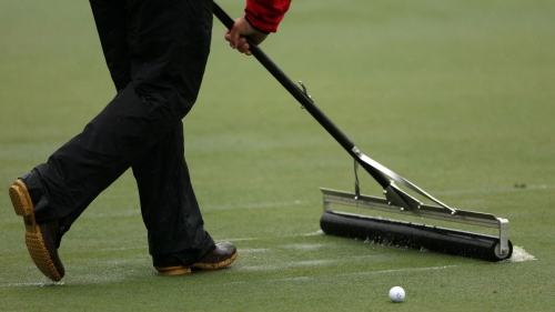 Water-soaked greens made life difficult for players.