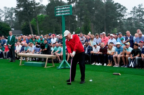 Golf legend Jack Nicklaus hits a ceremonial tee shot before the start of the first round. He was joined by Gary Player and Tom Watson.