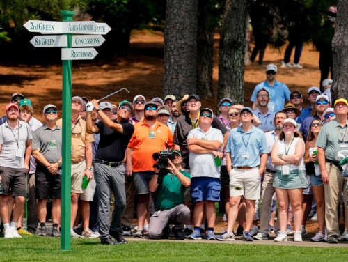 Phil Mickelson hits a shot on the second hole Thursday.