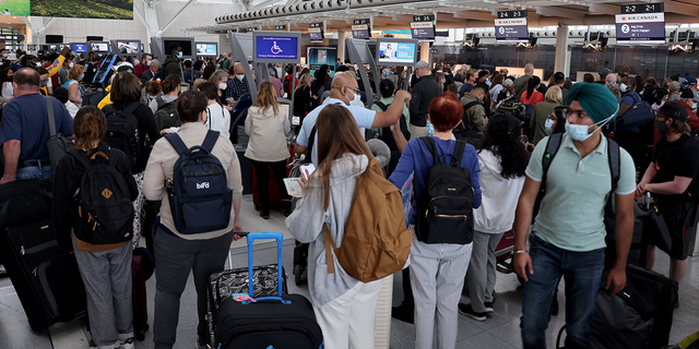 Crowd in terminal of Toronto Pearson international airport