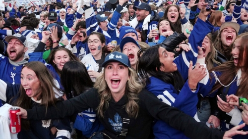 Fans in Maple Leaf Square celebrate.