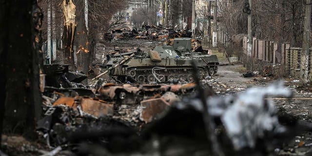 Destroyed Russian armored vehicles line the street in the city of Bucha, west of Kyiv, on March 4, 2022.
