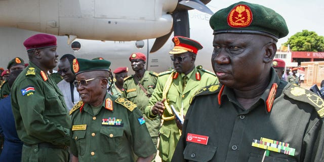 Several South Sudanese officials, including Deputy Chief of Defense Forces Lt. Gen. Thoi Chany Reat (right), have been accused of grave human rights violations by a United Nations-backed panel.