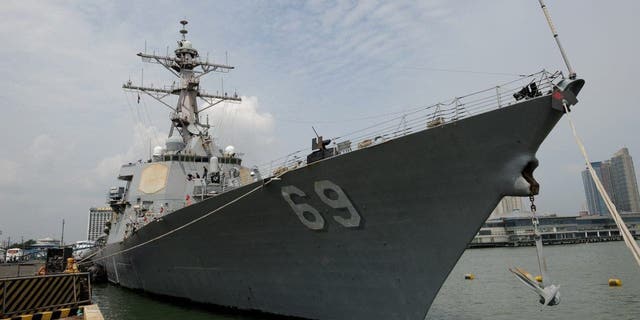 A general view shows the USS Milius DDG69, a multi-mission capable guided missile destroyer ship docked at the Manila south harbor on Aug. 18, 2012.