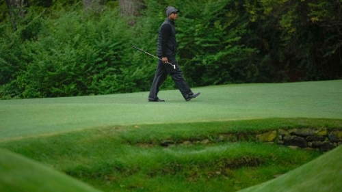Tiger Woods walks to the green on the 13th hole during the third round of the Masters. 