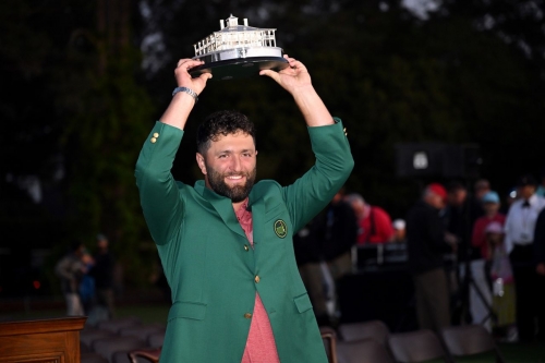 Jon Rahm poses with the Masters trophy during the green jacket ceremony, after winning the Masters tournament on Sunday, April 9.