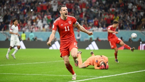 Bale celebrates after scoring for Wales against the USMNT during the Qatar 2022 World Cup.  