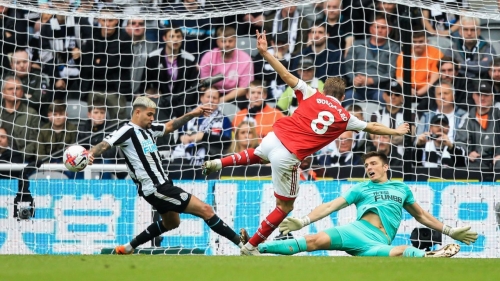 Martin Ødegaard opens the scoring for Arsenal. 