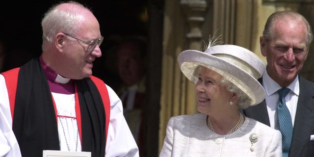 Then-Archbishop Carey with Queen Elizabeth II in 2002