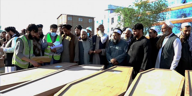 afghan migrants in coffins