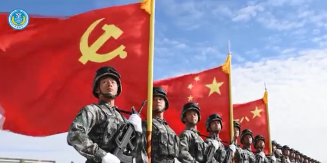 Chinese soldiers with Chinese flag in background