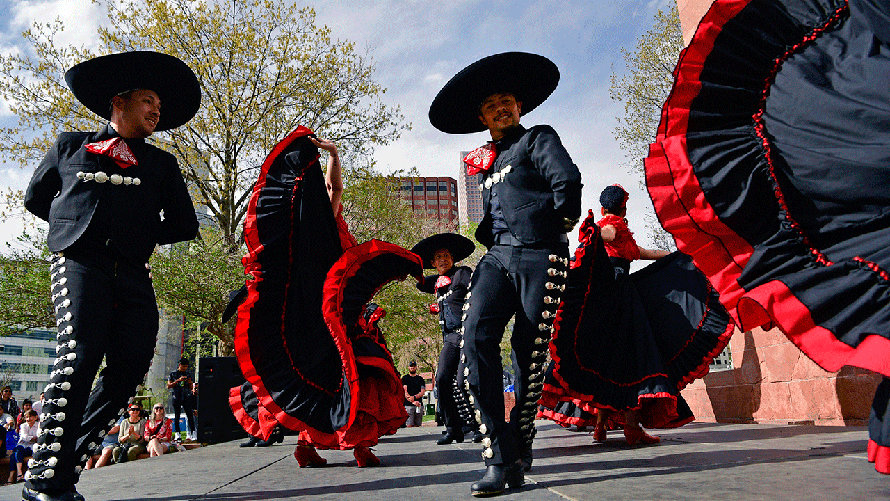 People dancing on stage for Cinco de Mayo