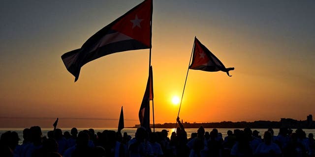 Cuban protesters at dusk