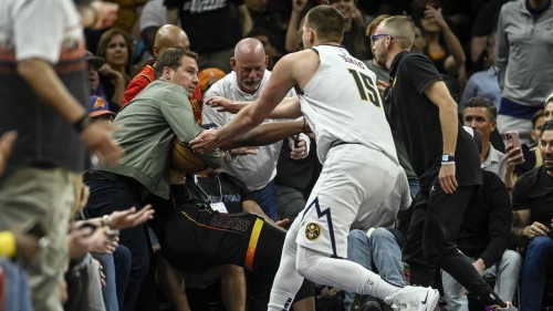 Nikola Jokić wrestled with Phoenix Suns owner Mat Ishbia in Game 4 of the Western Conference semifinal. 