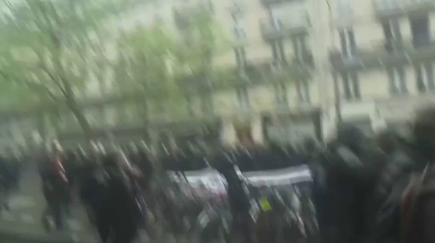 Police use tear gas at May Day protest in Paris