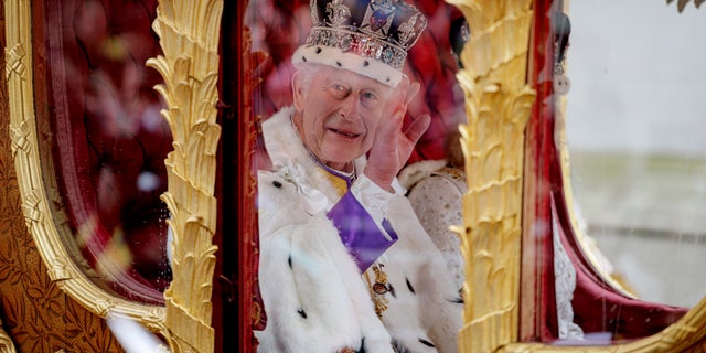 The king inside the Gold State Coach