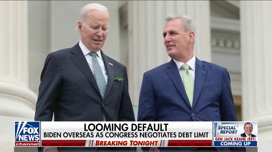 Biden heads overseas as Congress negotiates debt bill