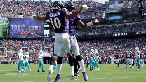 Jackson and Demarcus Robinson celebrate a touchdown against the Miami Dolphins on September 18, 2022.