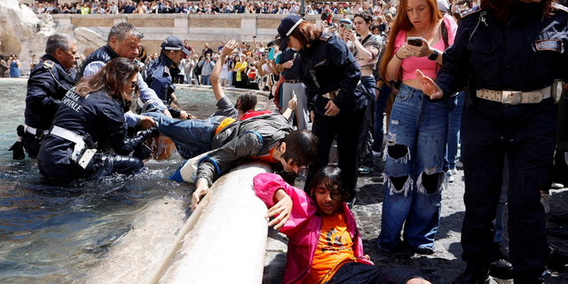 Italian police arrest Trevi Fountain protesters