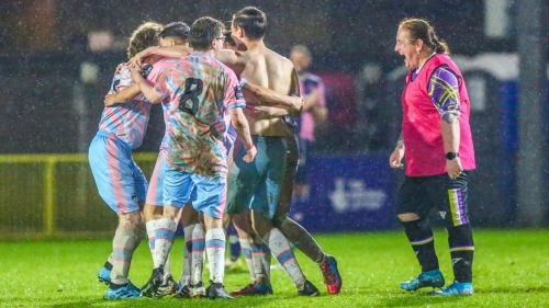 TRUK United FC's trans masculine team celebrate a goal in their match against Dulwich Supporters