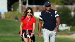 Woods and Herman walk on the Liberty National Golf Club course at the 2017 Presidents Cup in New Jersey.  