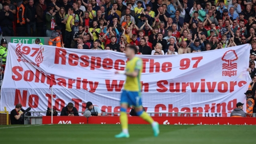 Nottingham Forest fans hold up a banner in memory of the 97 victims of the Hillsborough disaster.