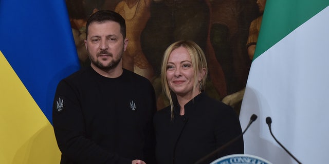 Zelenskyy shakes hands with Italian PM