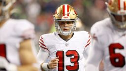 SEATTLE, WASHINGTON - DECEMBER 15: Brock Purdy #13 of the San Francisco 49ers heads to the locker room for halftime against the Seattle Seahawks at Lumen Field on December 15, 2022 in Seattle, Washington. (Photo by Steph Chambers/Getty Images)