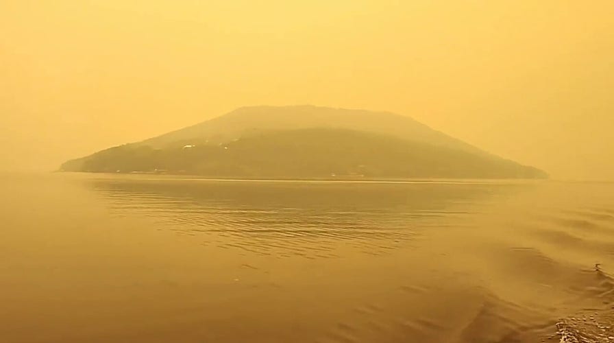 Smoky, yellow haze covers Upstate New York lake as Canadian wildfires impact U.S.