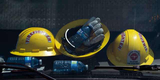 Firefighters helmets and water bottles