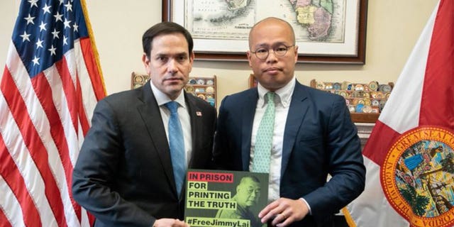 Lai and Rubio taking a photo together.