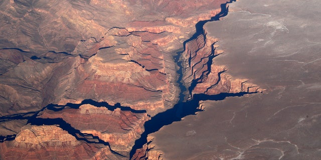 Aerial view showing red rock formations of the Grand Canyon