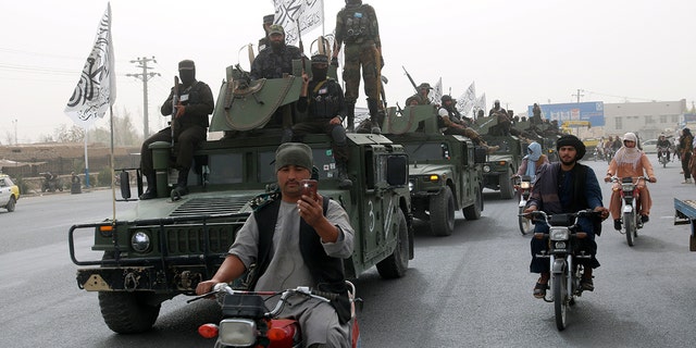 Taliban troops on a truck