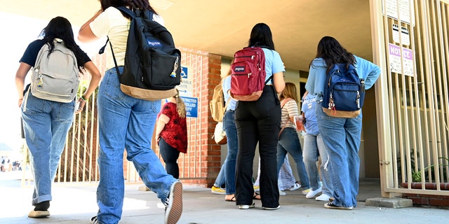 California high school students walking outside at school