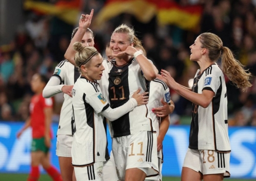 Germany's Alexandra Popp celebrates scoring a goal against Morocco.