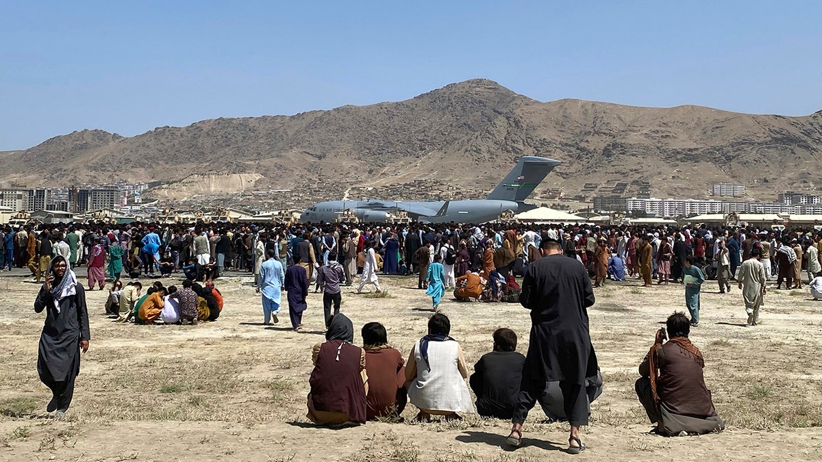 people gathered at airport in Kabul, Afghanistan