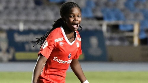 CALI, COLOMBIA - AUGUST 30: Linda Caicedo of Nacional celebrates the second goal of his team scored by Catalina Usme (out the frame) during a match between America de Cali and Atletico Nacional as part of Liga Aguila Femenina 2019 at Estadio Pascual Guerrero on August 30, 2019 in Cali, Colombia. (Photo by Gabriel Aponte/Vizzor Image/Getty Images)