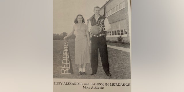 A yearbook photo of Alex Murdaughs parents smiling in a field