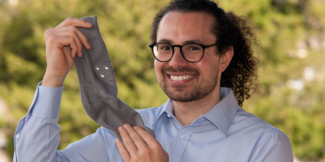 SmartSocks exec holding up company product