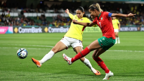 PERTH, AUSTRALIA - AUGUST 03: Ghizlane Chebbak of Morocco crosses the ball while Lorena Bedoya Durango of Colombia attempts to block during the FIFA Women's World Cup Australia & New Zealand 2023 Group H match between Morocco and Colombia at Perth Rectangular Stadium on August 03, 2023 in Perth, Australia. (Photo by Paul Kane/Getty Images)