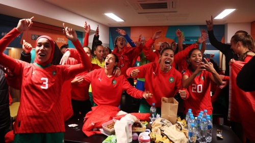 PERTH, AUSTRALIA - AUGUST 03: Nouhaila Benzina and Morocco players celebrate advancing to the knock out stage after the 1-0 victory in the dressing room following the FIFA Women's World Cup Australia & New Zealand 2023 Group H match between Morocco and Colombia at Perth Rectangular Stadium on August 03, 2023 in Perth, Australia. (Photo by Alex Grimm - FIFA/FIFA via Getty Images)