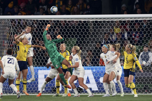 Naeher rises for a ball during the match against Sweden.