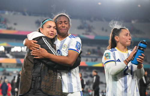 The Philippines' Dominique Randle, center, consoles a teammate after the loss to Norway. The Philippines, playing in its first Women's World Cup, was eliminated with the loss to Norway.