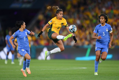 Australia's Mary Fowler controls the ball against Sakina Karchaoui and Wendie Renard of France during the quarterfinal match.