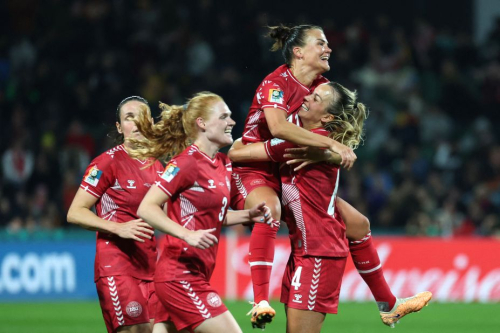 Danish players celebrate Amalie Vangsgaard's late goal that gave them a 1-0 victory over China on July 22.