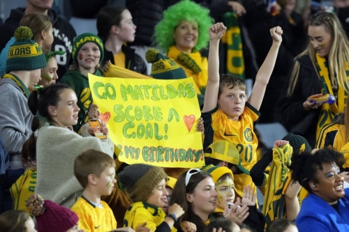Australian fans cheer prior to the match between the host team and Denmark.
