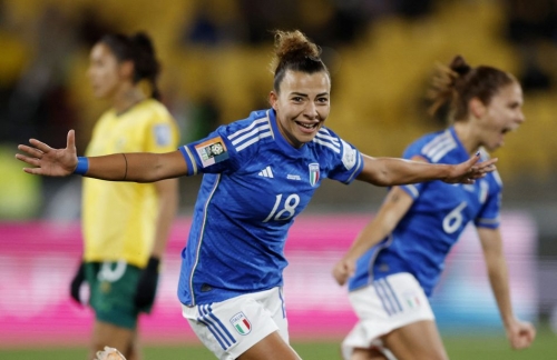 Italy's Arianna Caruso celebrates after scoring against South Africa.